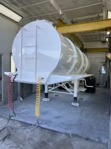 The new vacuum tank freshly painted and still in the spray booth